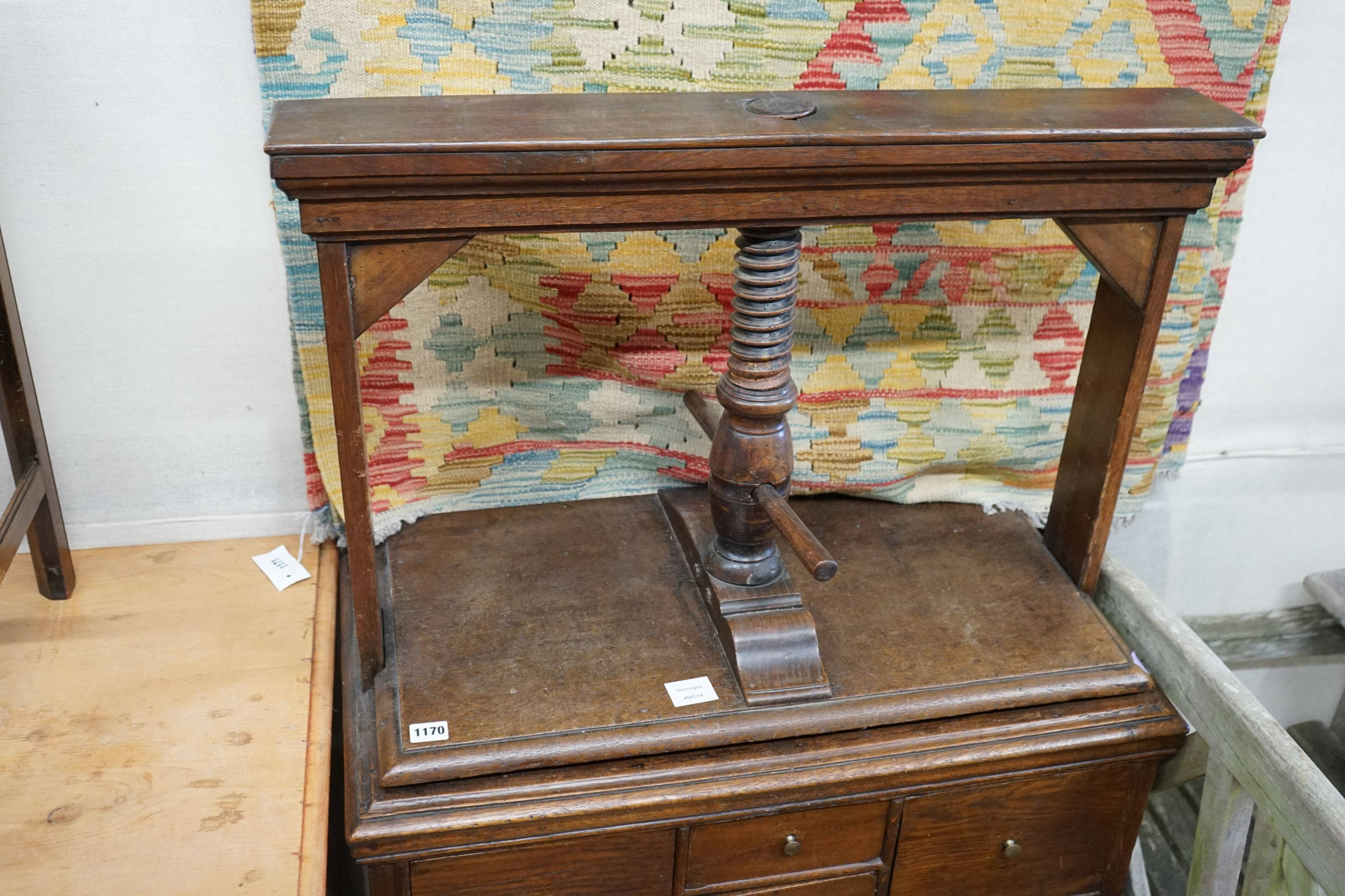 A George III provincial oak linen press, width 76cm, depth 42cm, height 140cm